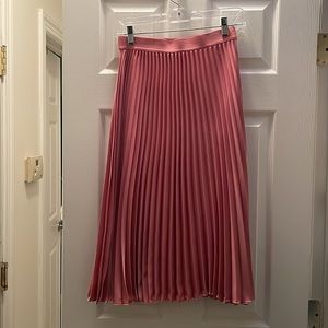 pink pleated midi skirt